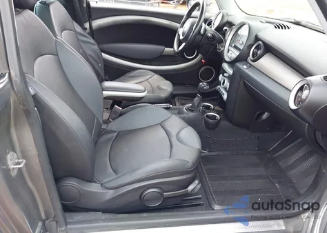 2009 Mini Cooper z USA, uszkodzony, nr VIN WMWMM433539TP9375